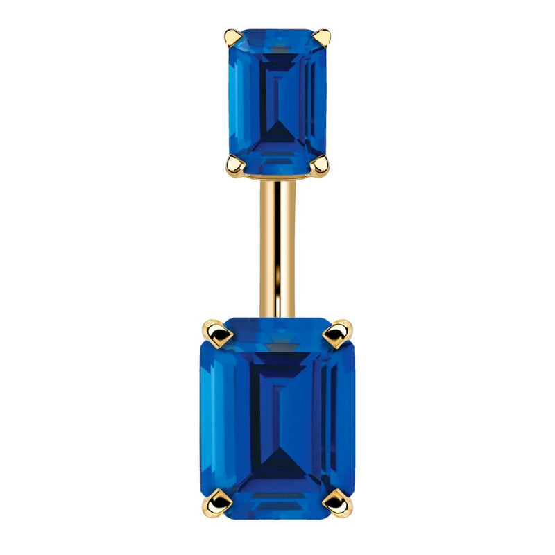 14k yellow gold belly ring with double emerald-cut sapphire blue CZ stones in four-prong settings, front view