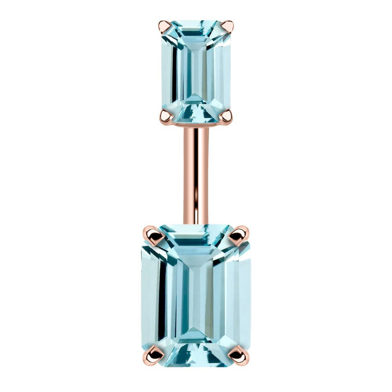 14k rose gold belly ring with double emerald-cut light blue CZ stones in four-prong settings, front view