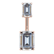 14k rose gold belly ring with double emerald-cut clear CZ stones in four-prong settings, front view
