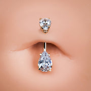 Double pear CZ 14k gold belly ring shown in a navel piercing for fit and scale reference