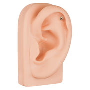 14k rose gold square cartilage stud shown in helix piercing on ear model for placement reference