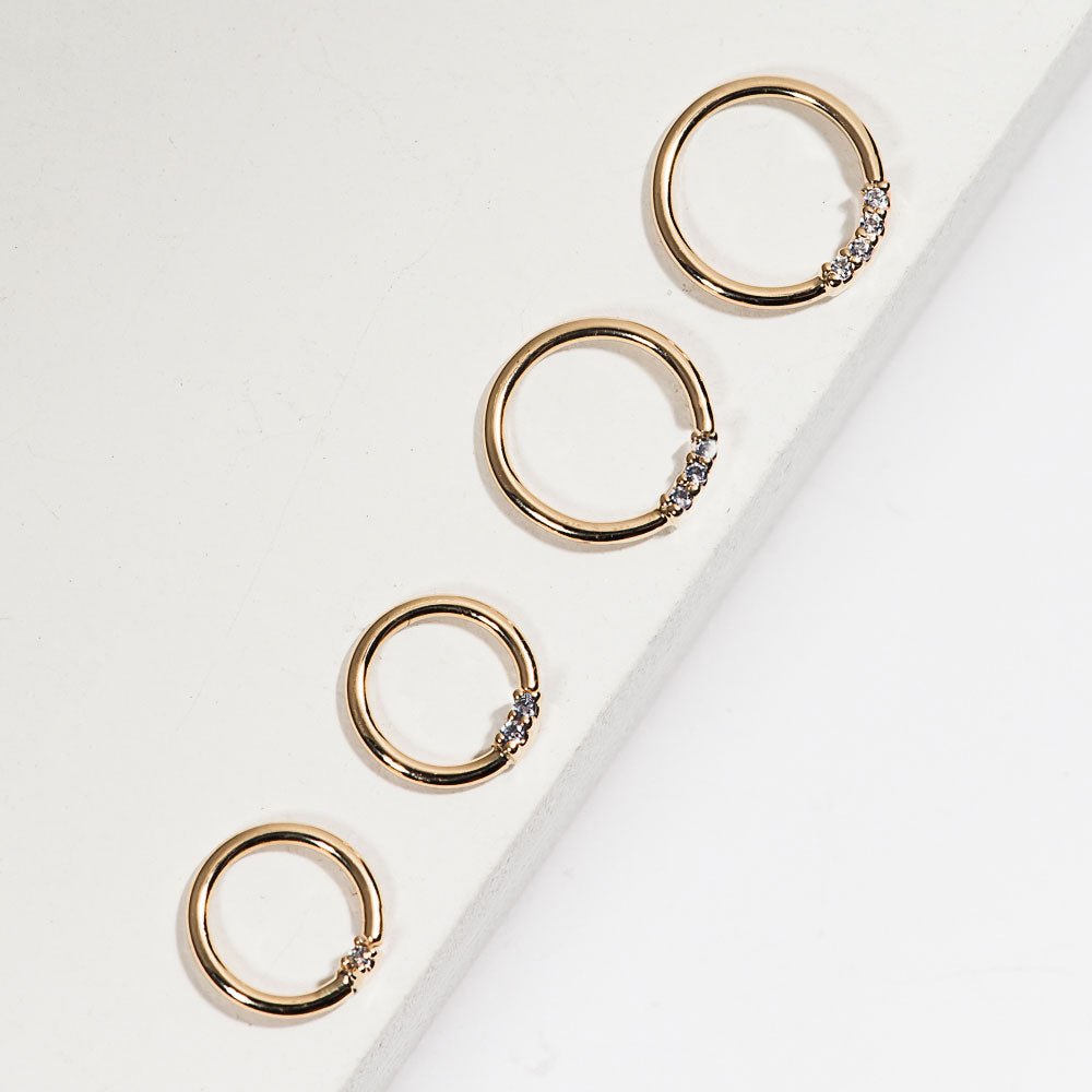 Yellow gold, diamond front facing seamless hoop rings