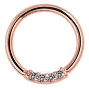 14K rose gold seamless seam ring with four VS1 diamonds set along the bottom, front view