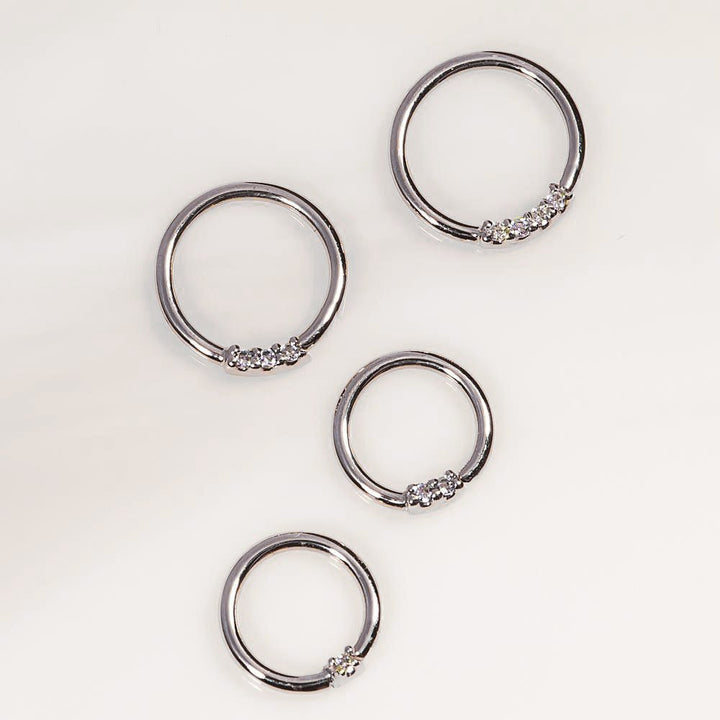 White gold, diamond front facing seamless hoop rings