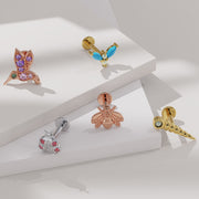 14K gold firefly flat back earring shown among nature-themed piercing jewelry collection on white surface