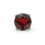 Close-up of genuine round garnet gemstone in four-prong white gold setting, front-facing detail view
