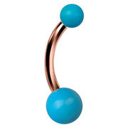Turquoise classic navel ring in 14k rose gold, angled view showing curved barbell shape