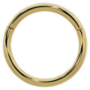 14k yellow gold plain clicker ring hoop, straight-on front view highlighting bright polished surface