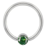 14k white gold fixed bead ring with emerald green round-cut CZ in bezel setting, front view
