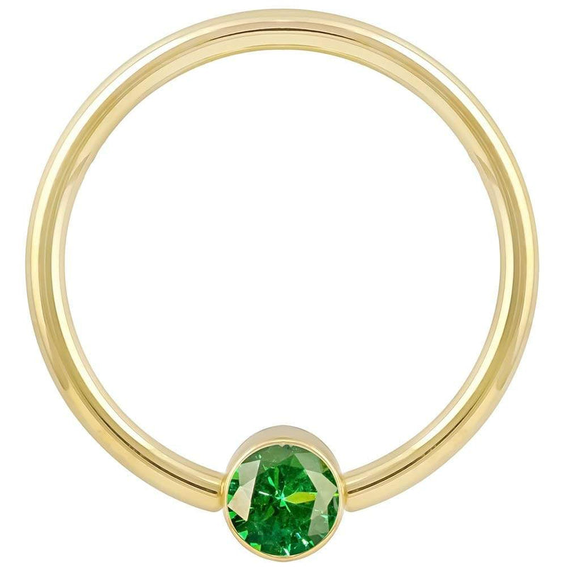 14k yellow gold green CZ bezel fixed bead ring, smaller gauge shown front view on white background
