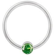 14k white gold green CZ bezel fixed bead ring, smaller gauge showing polished hoop and stone detail