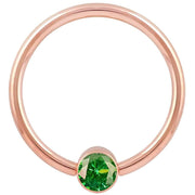 14k rose gold green cubic zirconia bezel fixed bead ring, smaller gauge showing warm rose tone hoop