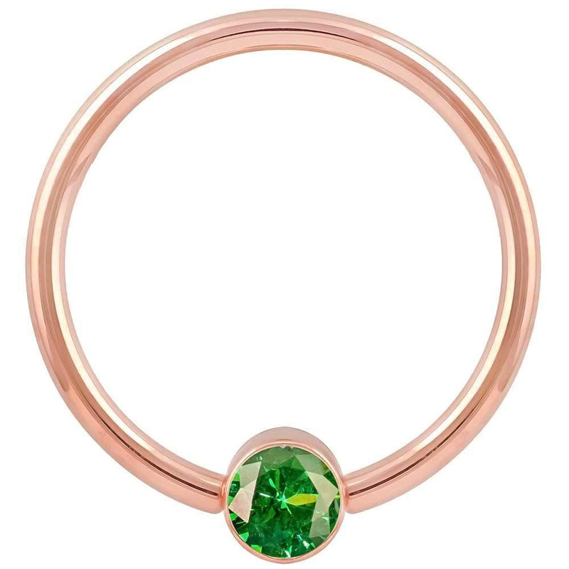 14k rose gold green cubic zirconia bezel fixed bead ring, smaller gauge showing warm rose tone hoop
