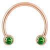 14k rose gold green CZ circular barbell, smaller diameter showing warm rose tone against bright green stones