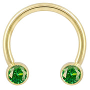 14k yellow gold circular barbell with dual green CZ round bezel ends, front view
