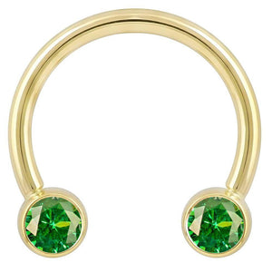 14k yellow gold circular barbell with dual green CZ round bezel ends, front view