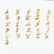 All 26 script letter options for 14K yellow gold initial flat back cartilage earring, A through Z