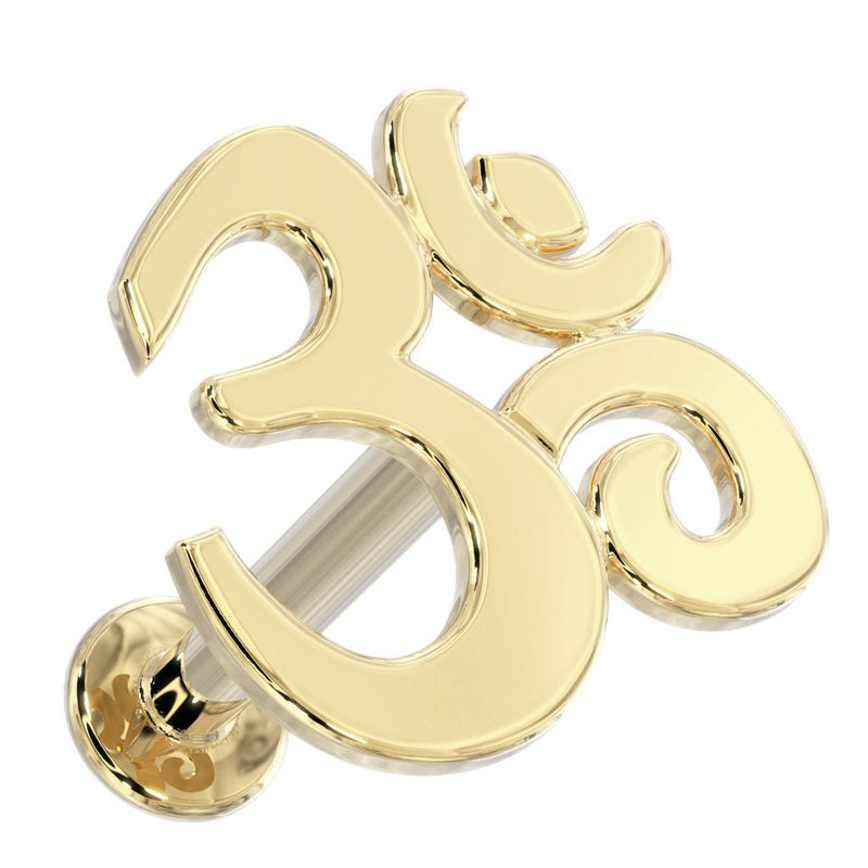 14k yellow gold Om symbol flat back labret stud, angled view showing post and flat disc backing