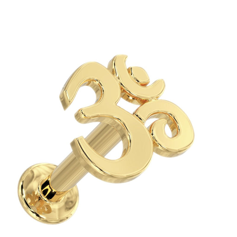14k yellow gold Om symbol flat back labret stud, angled view showing post and flat disc back