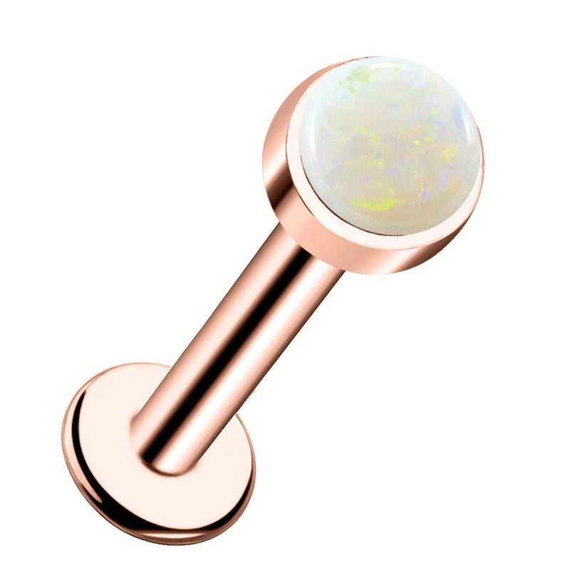 14k rose gold flat back labret stud with 3mm white opal cabochon in warm-toned bezel setting