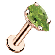 14k rose gold peridot pear-shaped flat back labret stud with prong setting, angled product view