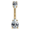 14k yellow gold belly ring with two clear CZ pear-shaped gems in prong settings, front view