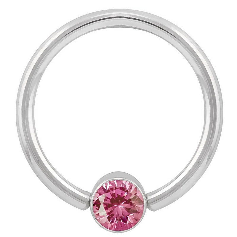 14k white gold fixed bead ring with pink round-cut CZ bezel setting, front view