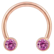 14k rose gold circular barbell with pink cubic zirconia bezel ends, large diameter front view