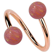 14k rose gold twister spiral barbell with simulated pink opal ball ends, warm rose-toned finish