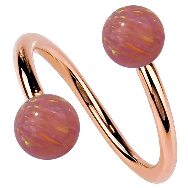 14k rose gold twister spiral barbell with simulated pink opal ball ends, warm rose-toned finish