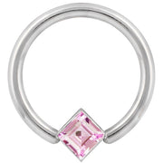 14k white gold fixed bead ring with large pink princess-cut CZ bezel, close-up front view