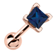 14k rose gold cartilage stud with princess cut deep blue sapphire birthstone in V-prong setting