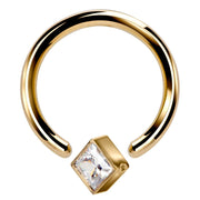 14k yellow gold fixed bead ring with princess-cut CZ, open view showing corner mount bead detail