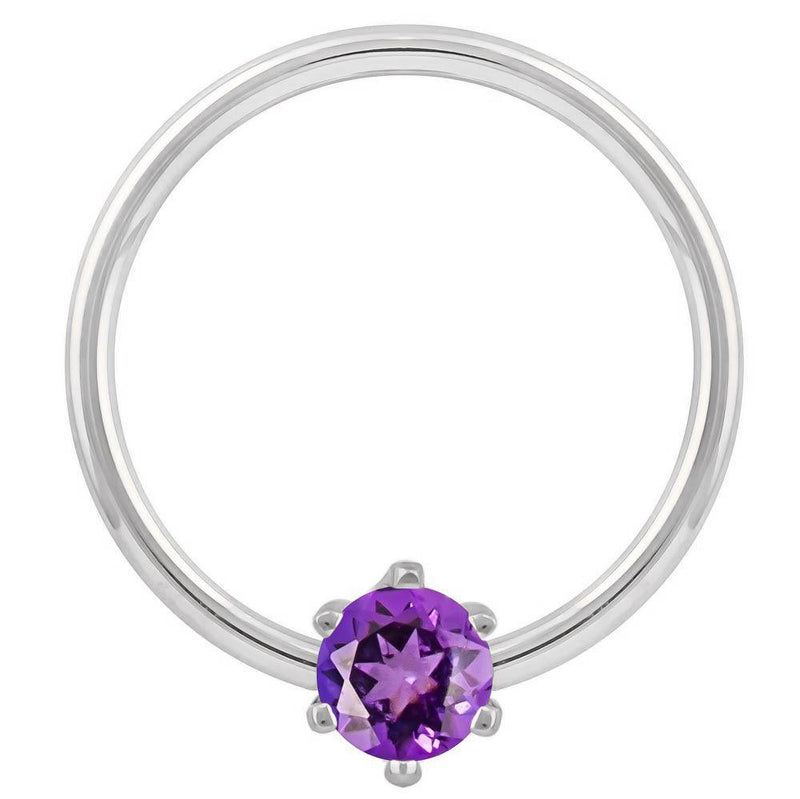 14k white gold fixed bead ring with purple CZ, larger diameter showing full hoop proportions