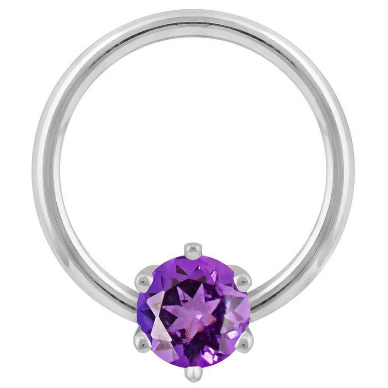14k white gold captive bead ring with purple cubic zirconia prong-set stone, front view