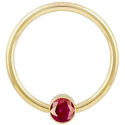 14k yellow gold red CZ bezel fixed bead ring, straight-on front view highlighting polished band