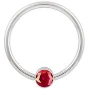 14k white gold red cubic zirconia fixed bead ring, straight-on front view showing bright polished finish