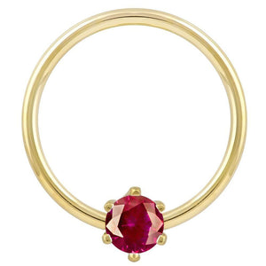 14k yellow gold fixed bead ring with round red CZ in six-prong setting, front view