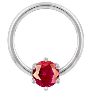 14k white gold captive bead ring with ruby-red round CZ prong-set at base, front view