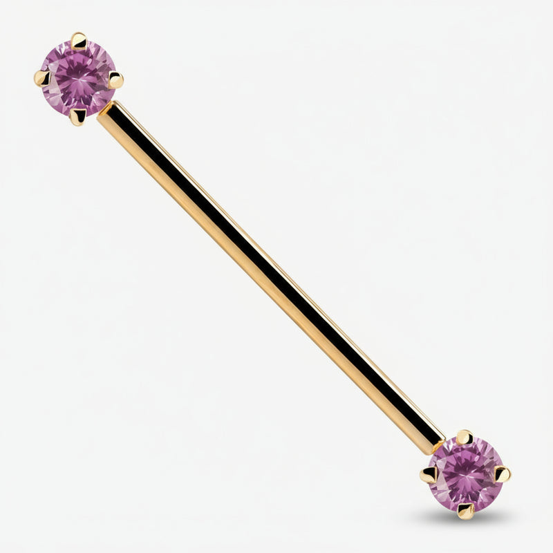 14k yellow gold industrial barbell with pink CZ ends, prong-set round-cut gems, front view