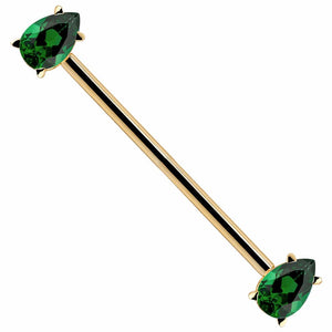 14k yellow gold industrial barbell with dual green pear-cut CZ gems in prong settings, white background