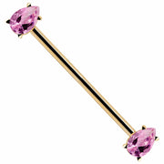 14k yellow gold industrial barbell with dual pink pear-cut CZ gems in prong settings, diagonal view