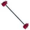 14k white gold industrial barbell with red teardrop CZ gems in prong settings, angled view