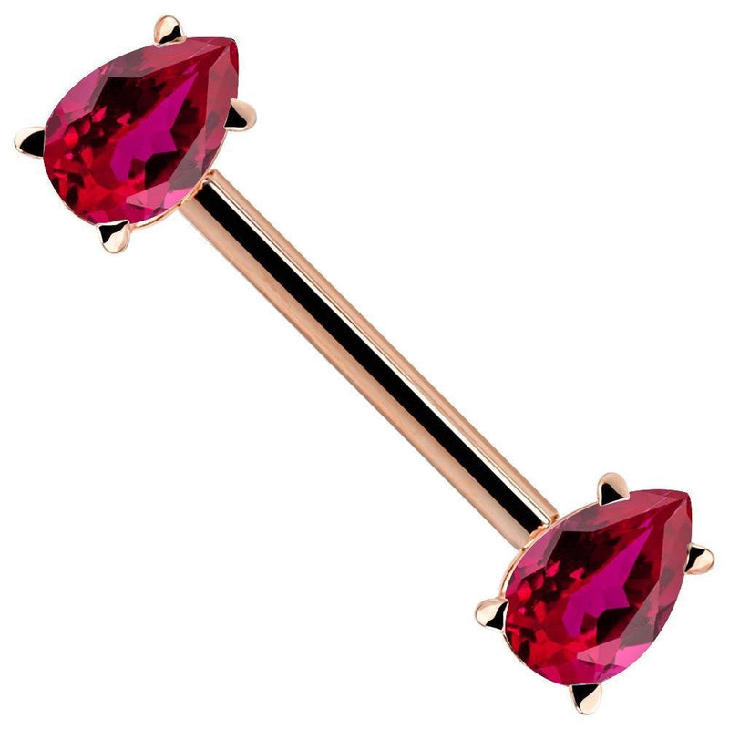 14K rose gold straight barbell with dual red pear-cut CZ gemstones in prong settings, angled view