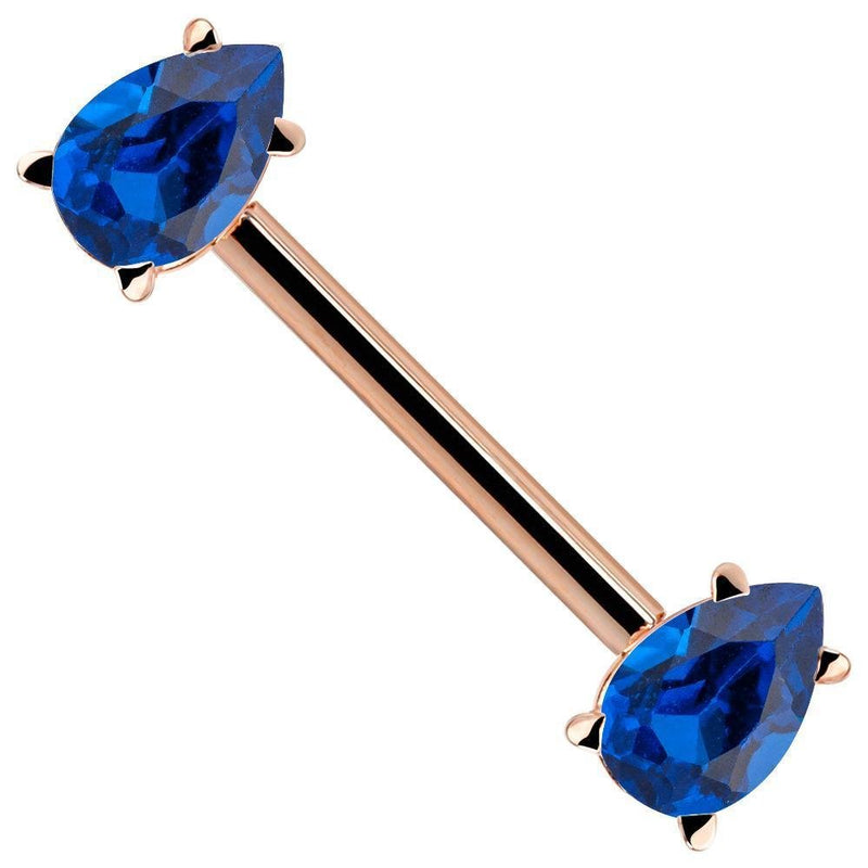 14K rose gold straight barbell with dual blue pear-cut CZ gemstones, angled side view
