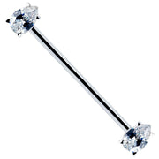 14k white gold industrial piercing barbell with clear pear-cut CZ gems, diagonal full-length view