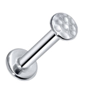 14K white gold hammered disc flat back labret stud, angled view showing textured disc and post