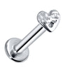 14k white gold hammered heart flat back labret, angled view showing cool silver tone and artisan-hammered heart charm