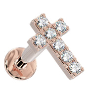 14k rose gold diamond cross flat back labret stud, angled view highlighting warm gold tone and sparkle
