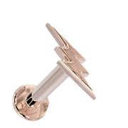 14k rose gold lightning bolt flat back labret stud, angled view highlighting warm rose tone and bolt design